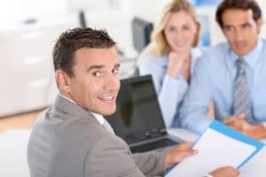 Banker explaining construction loan details
