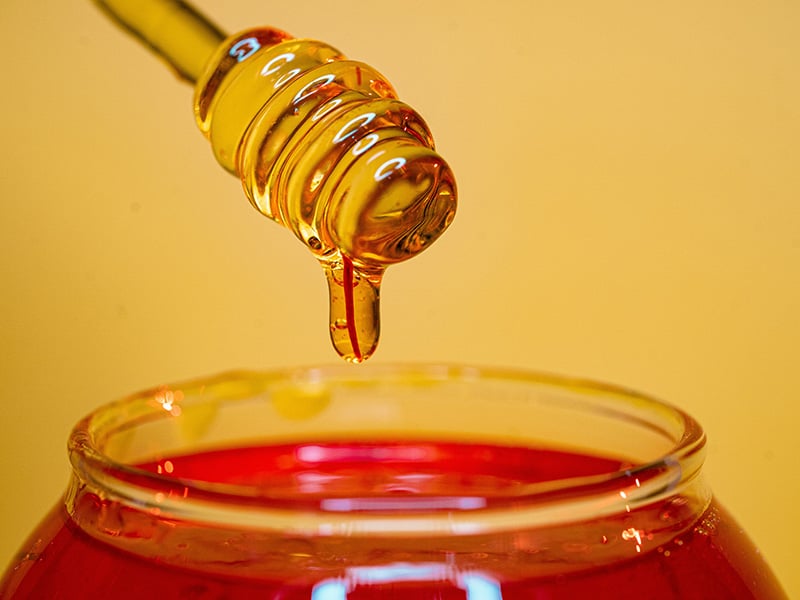 Close-up of honey dipper celebrating Minco Honey Festival in Minco, Oklahoma