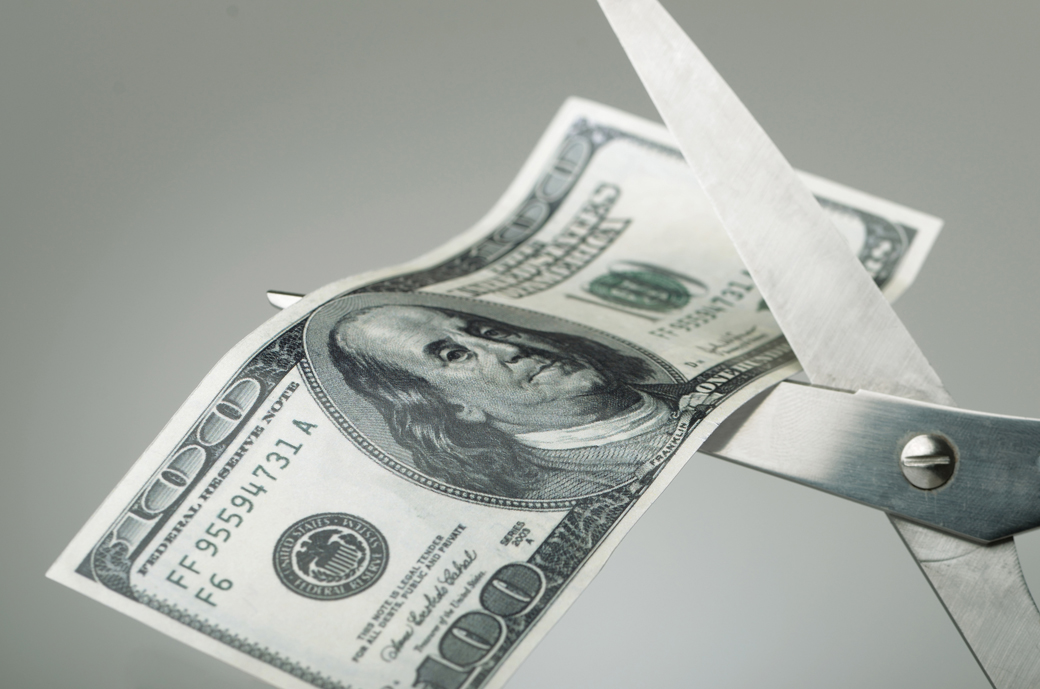 cutting money in half